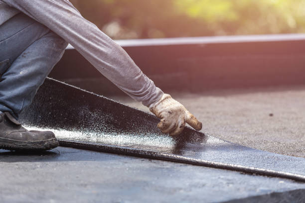 Professional Basement Waterproofing technician working in Benedict, MD